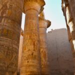 Mortuary Temple of Ramesses III at Medinet Habu, Luxor West Bank, featuring well-preserved colossal statues and reliefs. Book this excursion on your Nile cruise with Nile Cruisen.