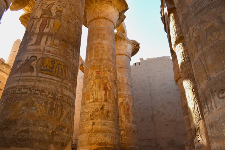 Mortuary Temple of Ramesses III at Medinet Habu, Luxor West Bank, featuring well-preserved colossal statues and reliefs. Book this excursion on your Nile cruise with Nile Cruisen.