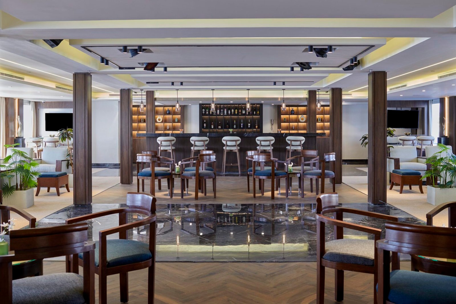 The elegant and fully stocked lounge bar on the Royal Lily Nile Cruise with comfortable seating for guests.