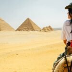 Tourists exploring the Great Pyramids of Giza with Nile Cruisen travel agent in Egypt