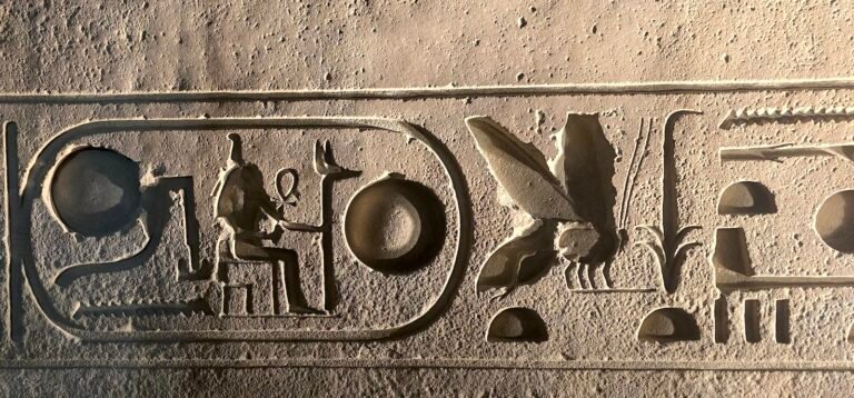 Ancient hieroglyphic inscription carved on the walls of Luxor Temple in Egypt