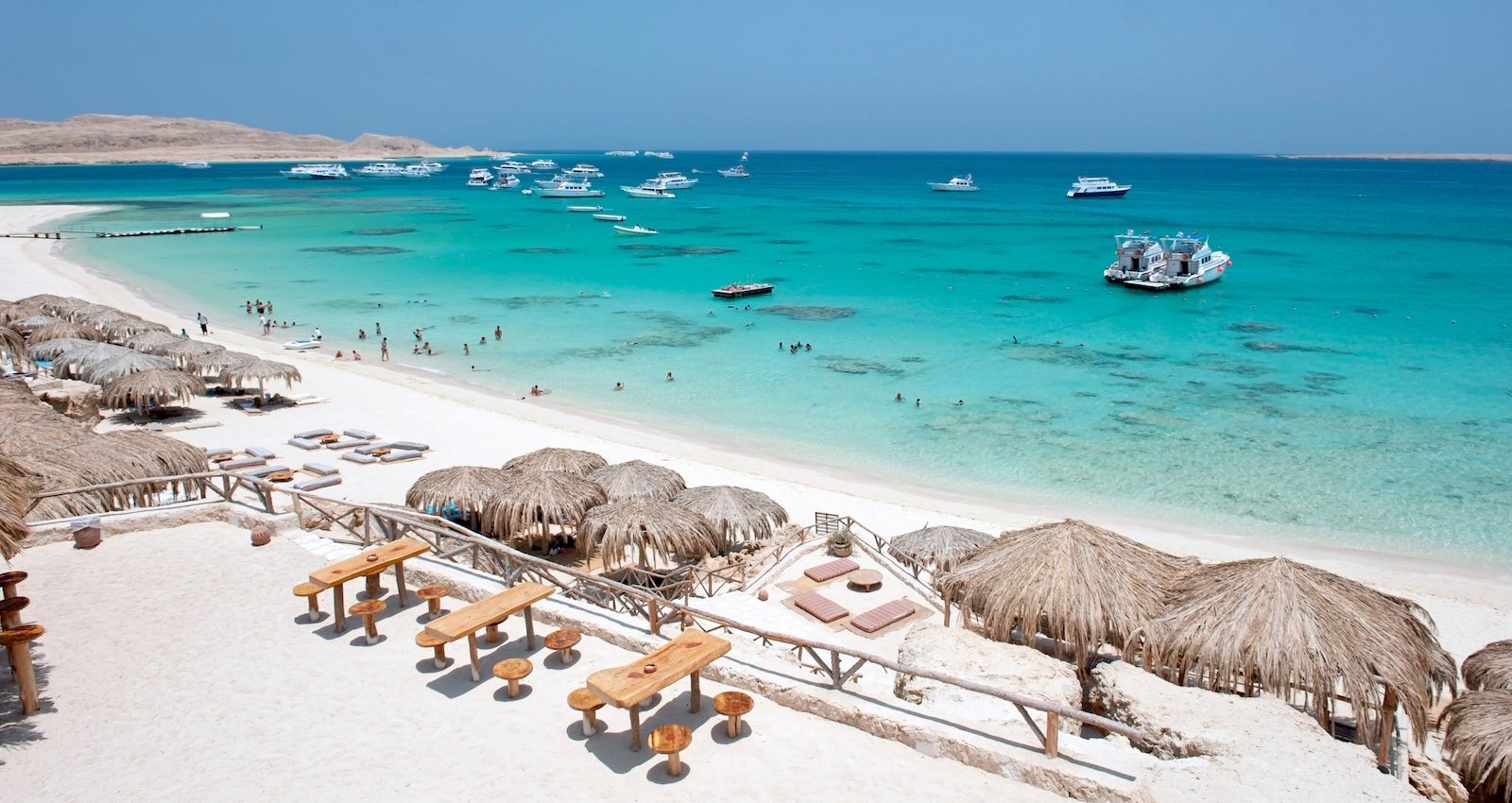 Beautiful Makadi Bay beach in Hurghada with clear turquoise water, luxury resorts, and relaxing atmosphere in Red Sea Egypt
