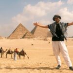Tourists visiting the Giza Pyramids with Nile Cruisen Egypt tour operator