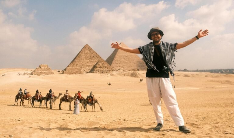 Tourists visiting the Giza Pyramids with Nile Cruisen Egypt tour operator