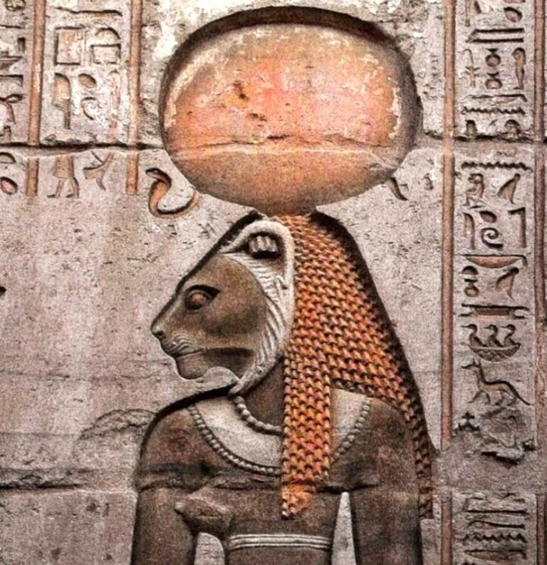 Goddess Bastet depicted as a cat-headed deity in ancient Egyptian art, symbolizing protection, joy, and fertility