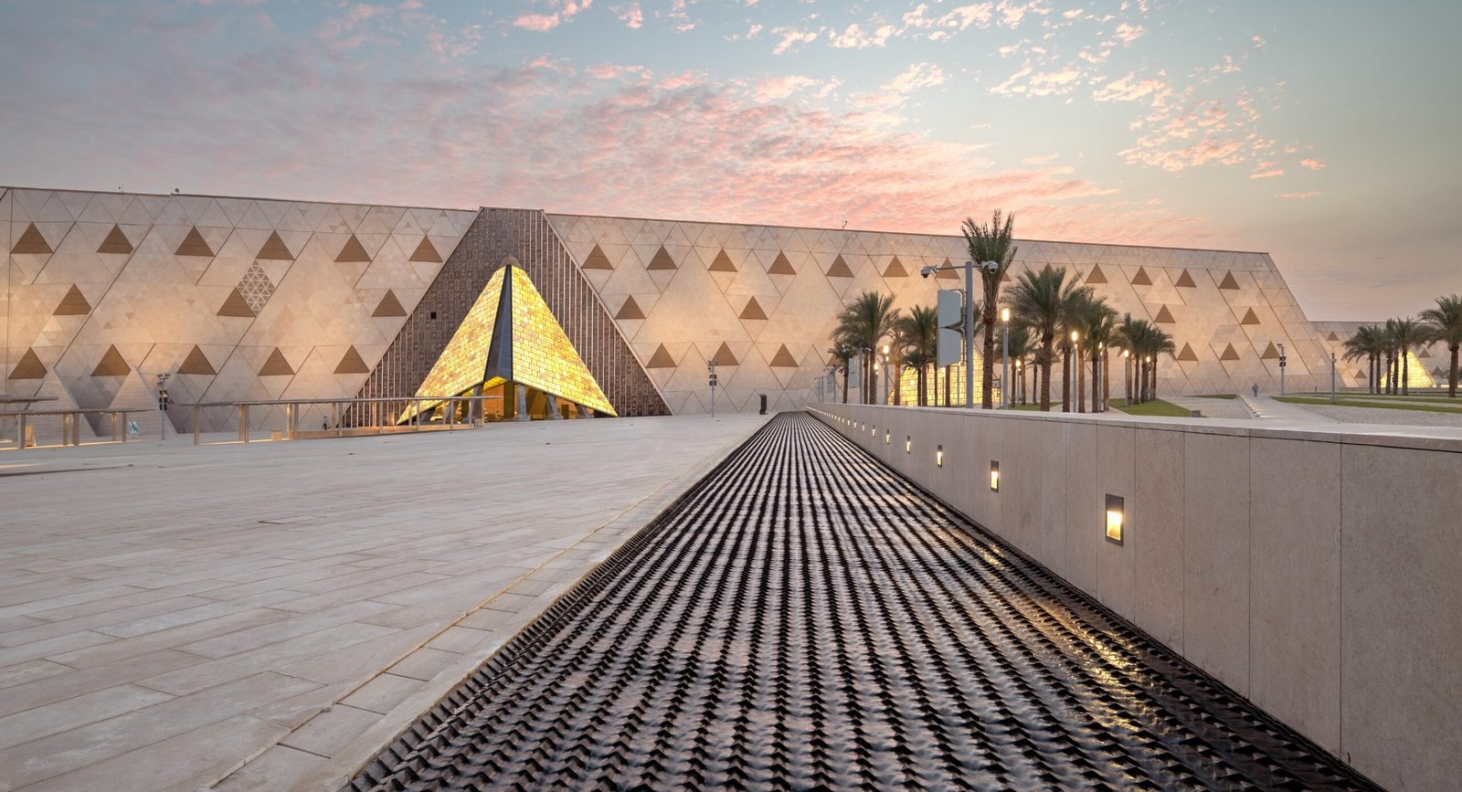 Grand Egyptian Museum in Giza Egypt with tourists enjoying a guided visit by Nile Cruisen