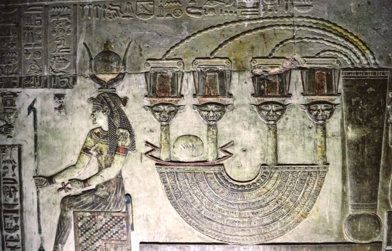Reliefs of goddess Hathor in Dendera Temple, ancient Egypt, featuring iconic cow-horn headdress