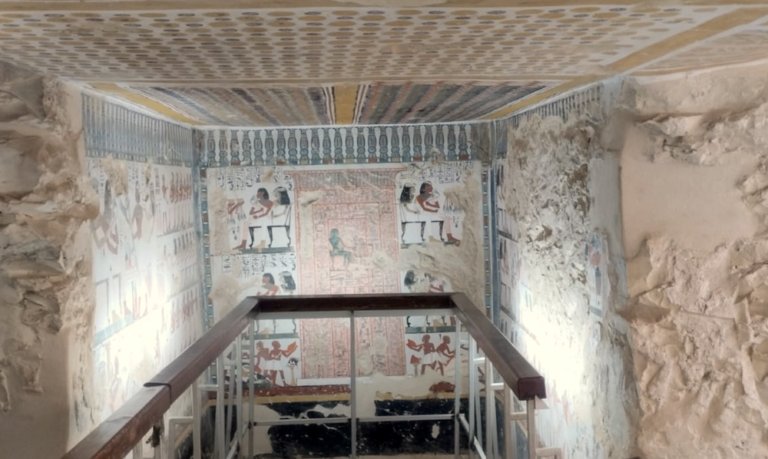 Ancient tombs on Luxor West Bank with colorful hieroglyphs and wall paintings in Egypt