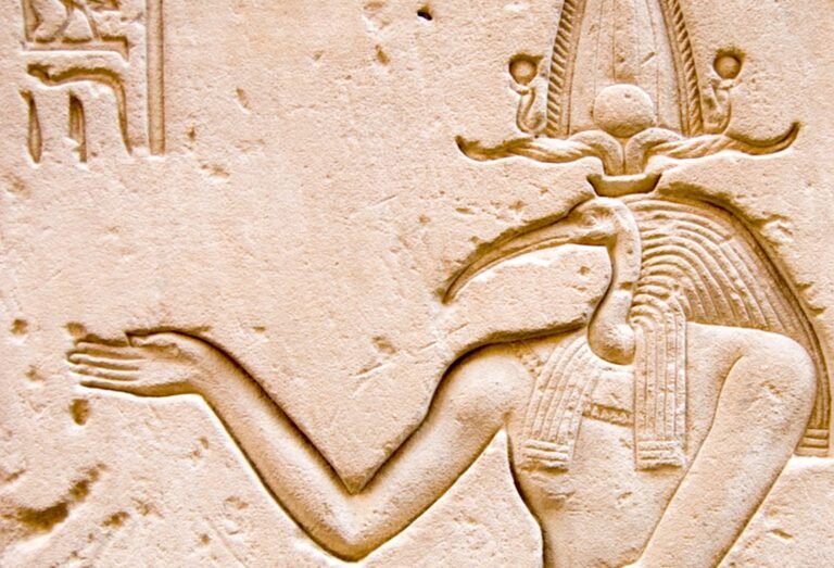 Thoth god of wisdom in ancient Egypt depicted with ibis head at temple wall during Nile Cruisen tour