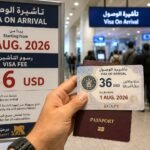 International traveler holding an Egypt visa and passport, preparing to visit Egypt with Nile Cruisen for a luxury Nile cruise between Luxor and Aswan.