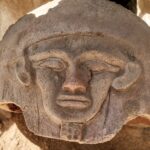 Ancient archaeological stone carving discovered in Bahariya Oasis, Egypt, linked to the discovery of three tombs from the Pharaonic and Roman eras