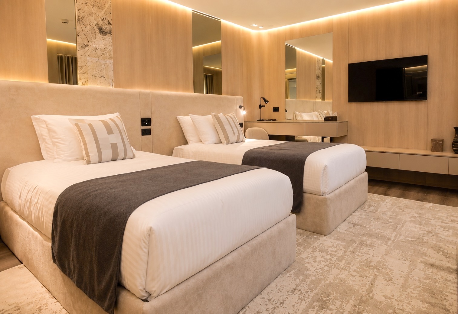 Twin beds in a comfortable Rafaheya Dahabeya suite