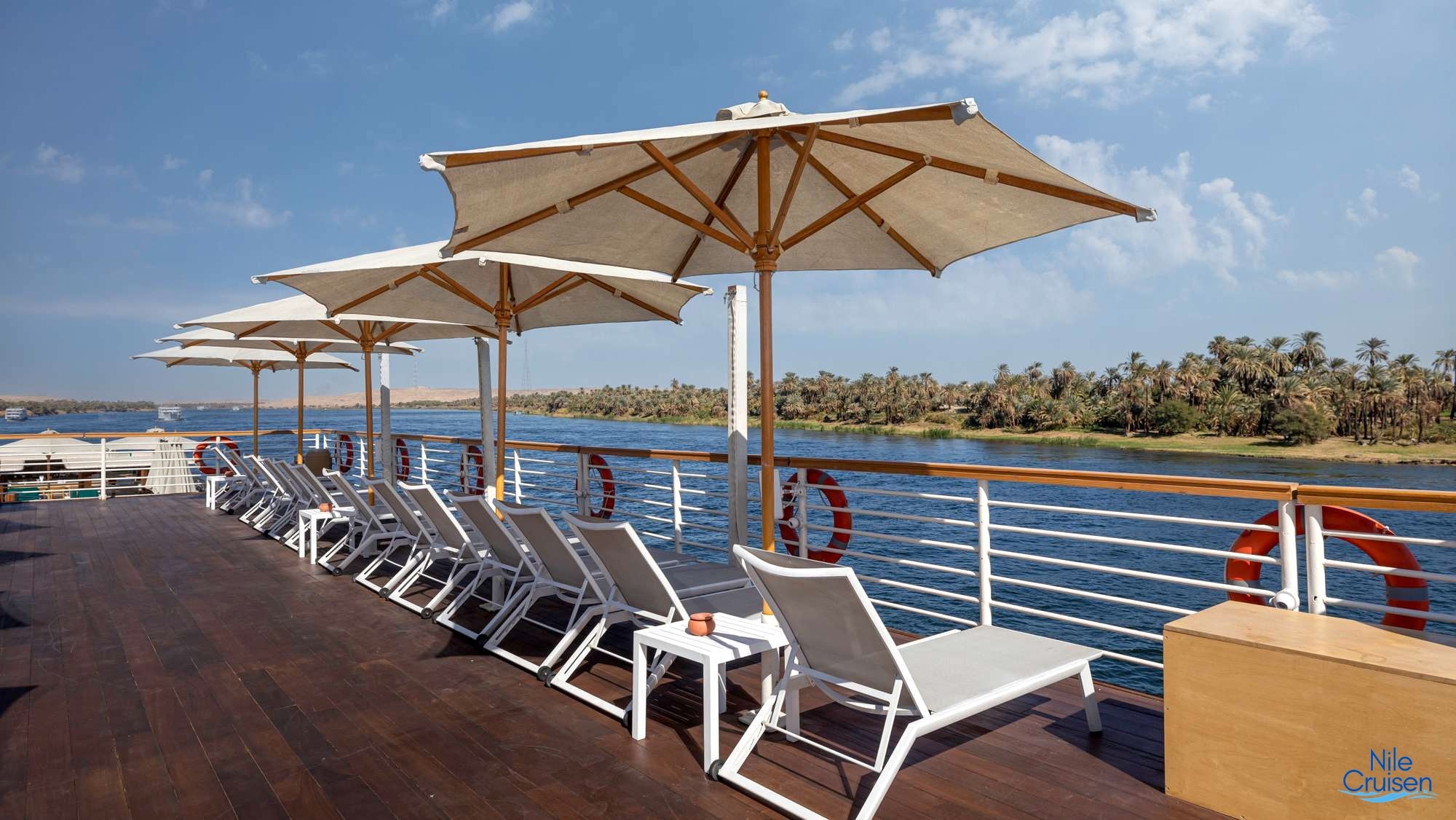 TIA Boutique Nile Cruise sundeck with comfortable seating and panoramic Nile views