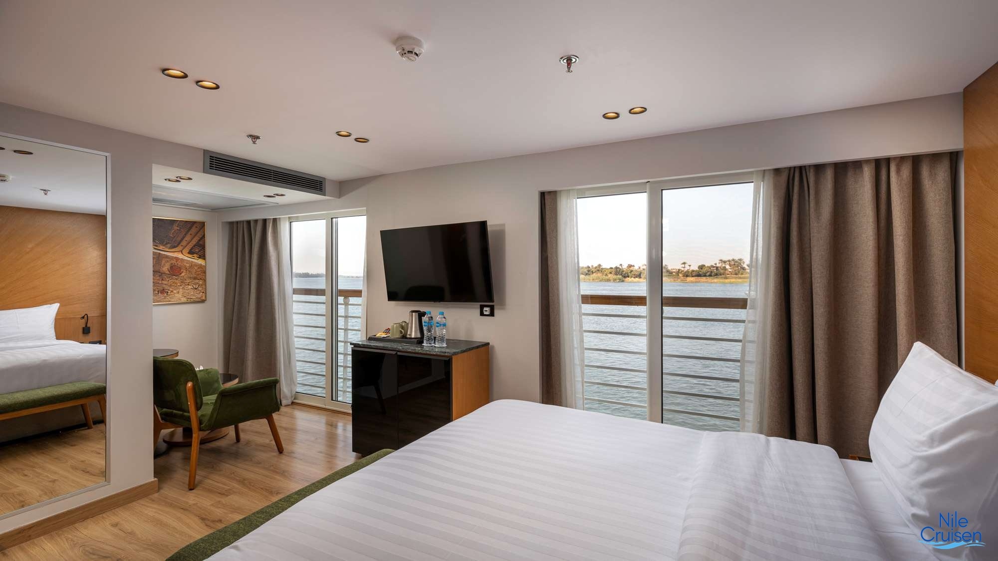 TIA Boutique Nile Cruise cabin with modern furnishings and Nile views in Egypt