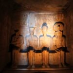 Sunlight illuminating the statue of Ramesses II inside the Great Temple of Abu Simbel